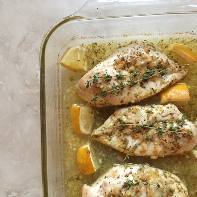 baked lemon garlic chicken with thyme + oregano | via she likes to eat