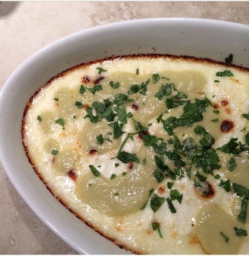 monterey jack & goat cheese queso fundido with hatch green chile vinaigrette | via she likes to eat